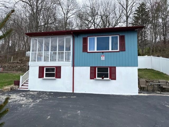214SHOREDRIVE Shore Dr, Brewster, NY 10509 - view of outbuilding with a sunroom, stairs, and driveway