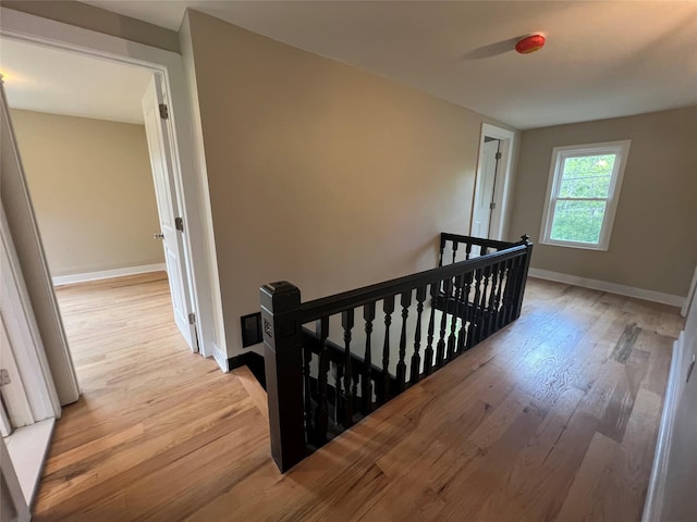 692 Burlingham Rd, Bloomingburg, NY 12721 - stairway with wood finished floors and baseboards