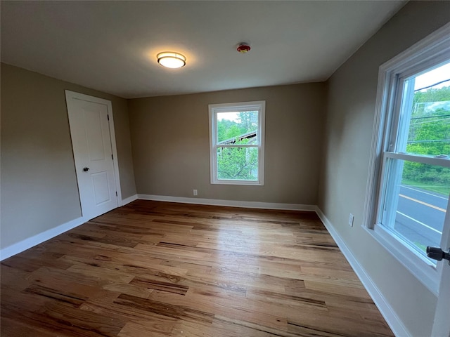692 Burlingham Rd, Bloomingburg, NY 12721 - empty room featuring wood finished floors and baseboards