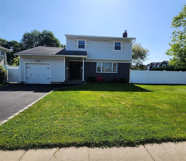 47 Barnum Ave, Plainview, NY 11803 - view of front of property featuring a garage, a chimney, and asphalt driveway
