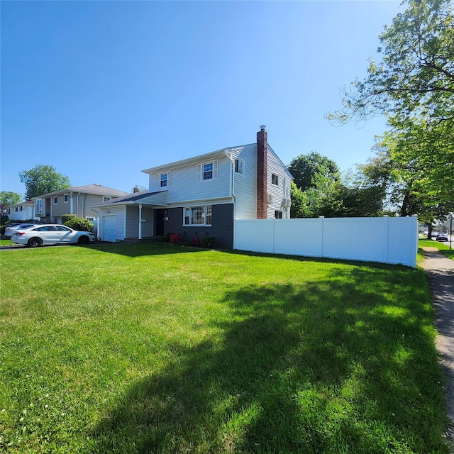 47 Barnum Ave, Plainview, NY 11803 - back of property with a chimney and a garage