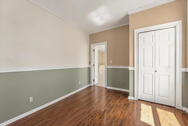 1465 Mayflower Ave, Bronx, NY 10461 - unfurnished bedroom featuring ornamental molding, wood finished floors, baseboards, and a closet