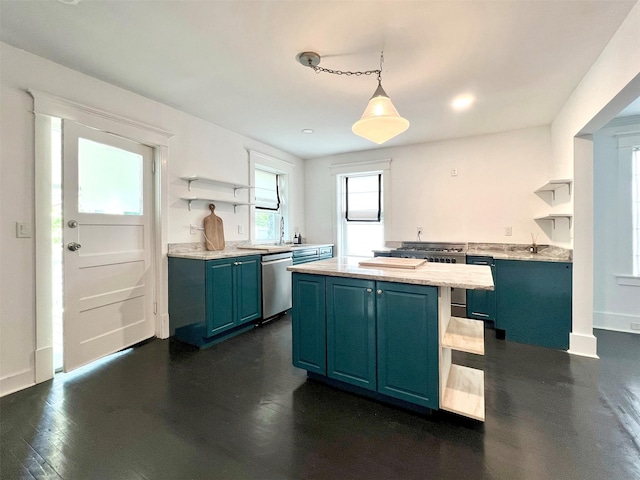 17 Washington Ave, Millbrook, NY 12545 - kitchen with open shelves, stainless steel dishwasher, light countertops, blue cabinets, and recessed lighting