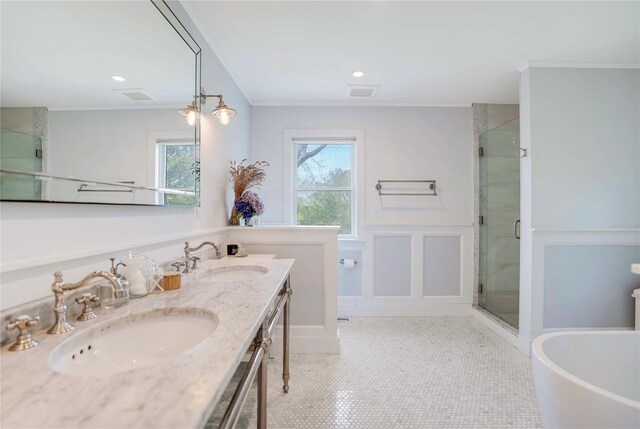 6 Beech Hollow Ct, Montauk, NY 11954 - full bath with plenty of natural light, crown molding, a shower stall, a freestanding tub, and a decorative wall