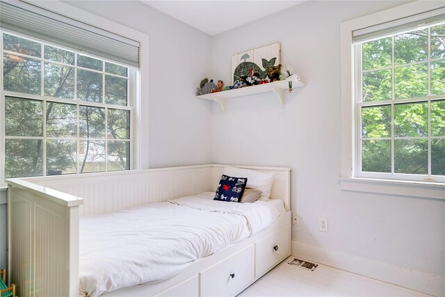 6 Beech Hollow Ct, Montauk, NY 11954 - bedroom featuring multiple windows and baseboards