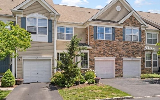 5 Case Ct, Monroe, NY 10950 - multi unit property featuring a garage, driveway, and stone siding