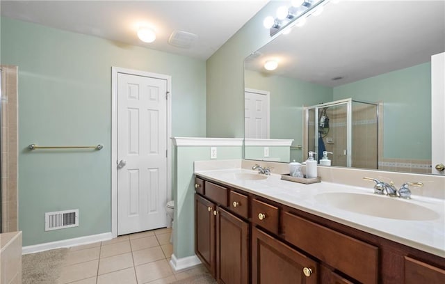 5 Case Ct, Monroe, NY 10950 - full bathroom with a shower stall, double vanity, toilet, tile patterned flooring, and baseboards