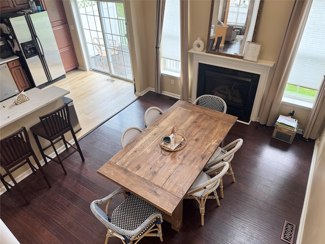5 Case Ct, Monroe, NY 10950 - dining space featuring light wood finished floors, a fireplace, and baseboards