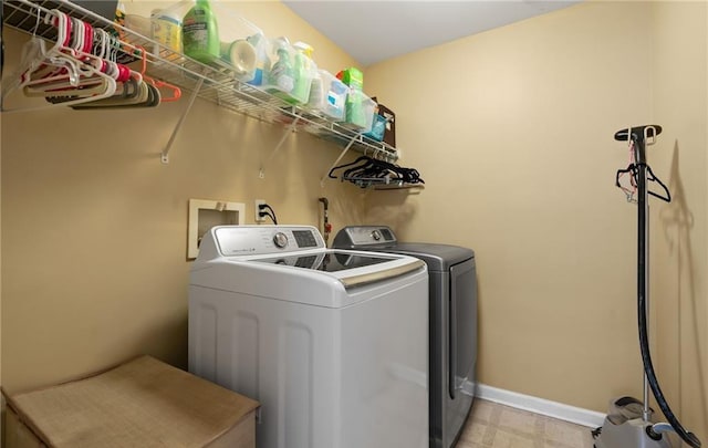 5 Case Ct, Monroe, NY 10950 - laundry area with washer and clothes dryer, baseboards, and light flooring