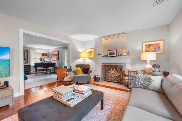5 Gabriels Dr, Chester, NY 10918 - living room featuring wood finished floors, a tile fireplace, and baseboards