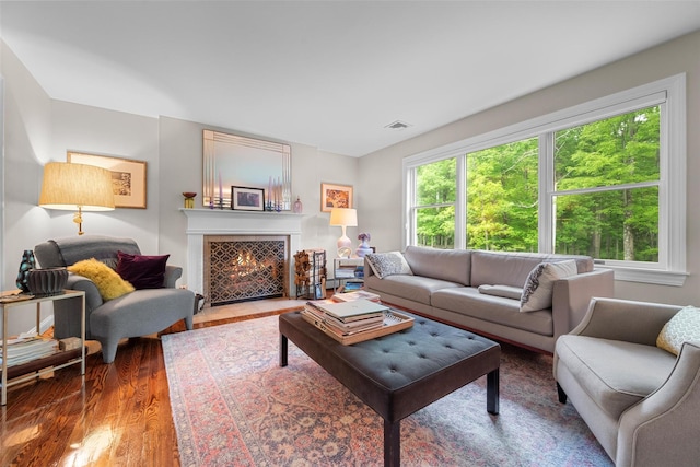 5 Gabriels Dr, Chester, NY 10918 - living room featuring wood finished floors and a fireplace with flush hearth