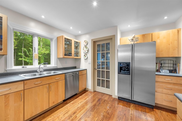 5 Gabriels Dr, Chester, NY 10918 - kitchen featuring stainless steel appliances, a sink, light wood finished floors, glass insert cabinets, and dark countertops