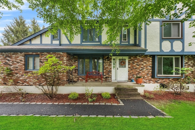 3 Sebastian Ct, Hopewell Junction, NY 12533 - english style home featuring covered porch, stucco siding, and brick siding