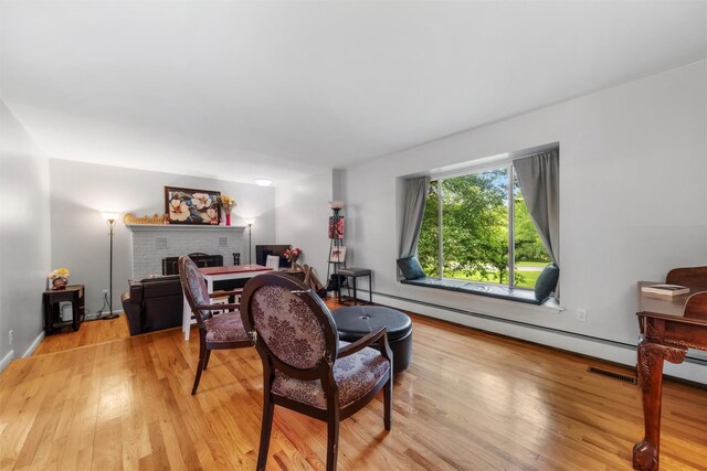 3 Sebastian Ct, Hopewell Junction, NY 12533 - living room with wood finished floors, a fireplace, and baseboards