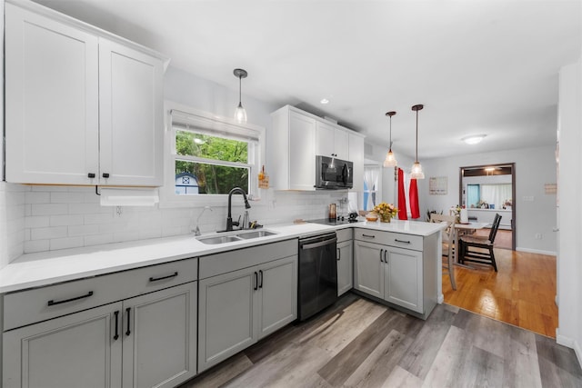 3 Sebastian Ct, Hopewell Junction, NY 12533 - kitchen with appliances with stainless steel finishes, a sink, a peninsula, gray cabinetry, and backsplash