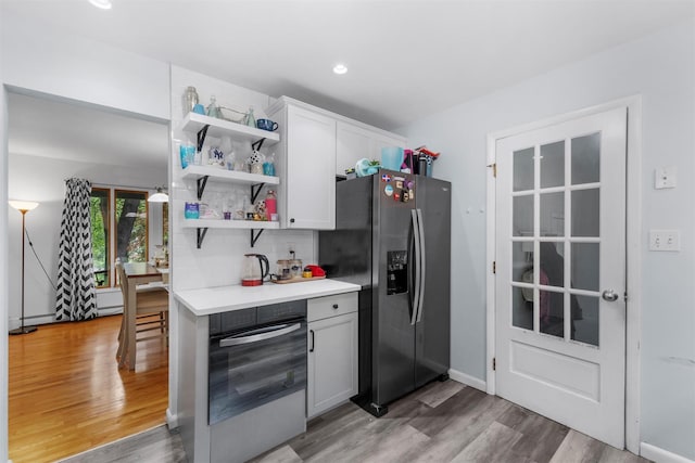 3 Sebastian Ct, Hopewell Junction, NY 12533 - kitchen with stainless steel fridge, open shelves, light wood-style flooring, light countertops, and recessed lighting