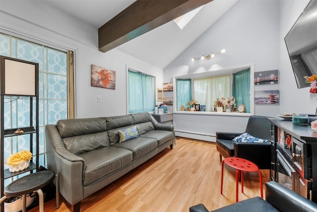 3 Sebastian Ct, Hopewell Junction, NY 12533 - living area with baseboard heating, a skylight, wood finished floors, high vaulted ceiling, and beam ceiling
