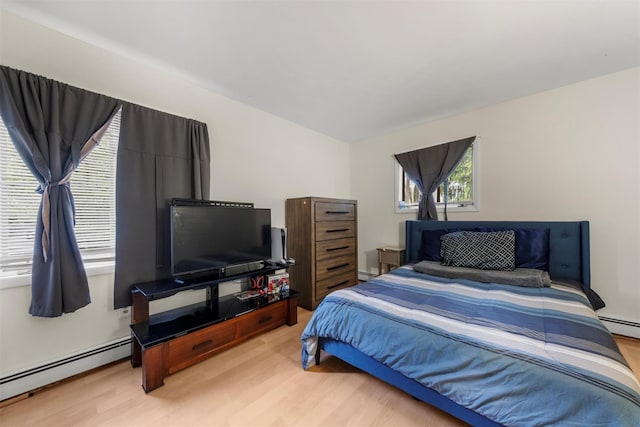 3 Sebastian Ct, Hopewell Junction, NY 12533 - bedroom featuring light wood-style floors and a baseboard heating unit