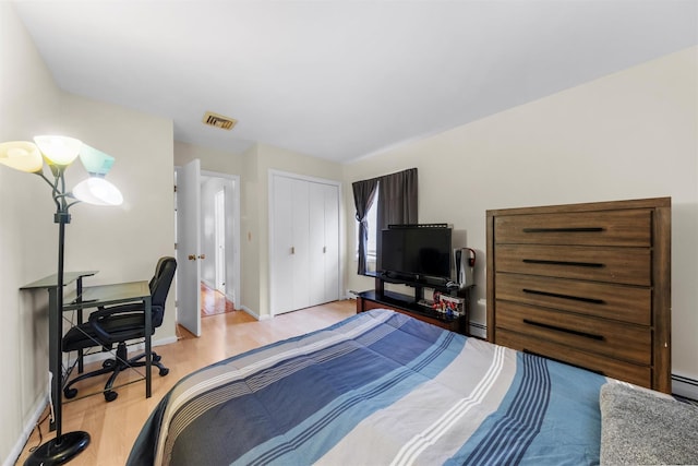 3 Sebastian Ct, Hopewell Junction, NY 12533 - bedroom with light wood-style floors, an office area, baseboards, a closet, and baseboard heating