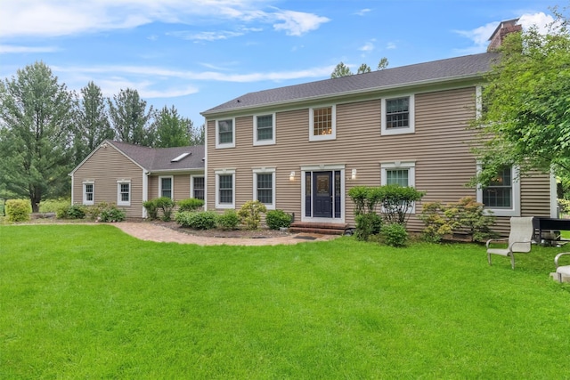 150 Cedar Ave, Poughkeepsie, NY 12603 - colonial house featuring a front lawn