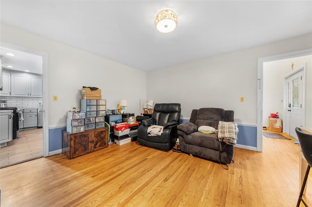150 Cedar Ave, Poughkeepsie, NY 12603 - living area with light wood-style flooring and baseboards
