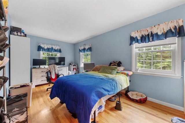 150 Cedar Ave, Poughkeepsie, NY 12603 - bedroom featuring wood finished floors, baseboards, and a desk