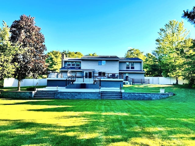 9 Hill And Tree Ct, Melville, NY 11747 - rear view of property with a wooden deck and stairway