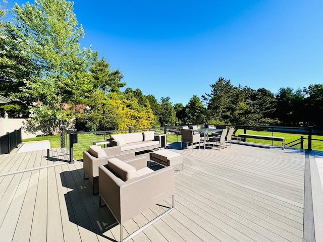 9 Hill And Tree Ct, Melville, NY 11747 - wooden deck with outdoor dining space, an outdoor hangout area, and view of scattered trees