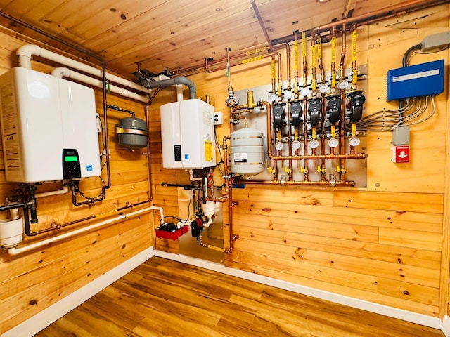 9 Hill And Tree Ct, Melville, NY 11747 - utility room with tankless water heater