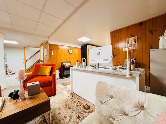 9 Hill And Tree Ct, Melville, NY 11747 - living area featuring wooden walls