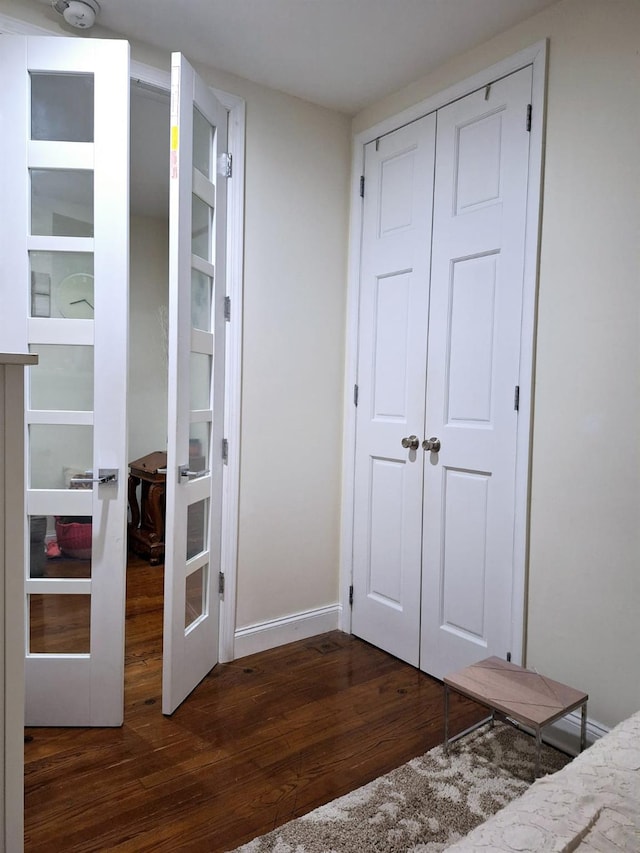 92-11 35th Ave Unit 2P, Jackson Heights, NY 11372 - unfurnished bedroom featuring wood finished floors and a closet