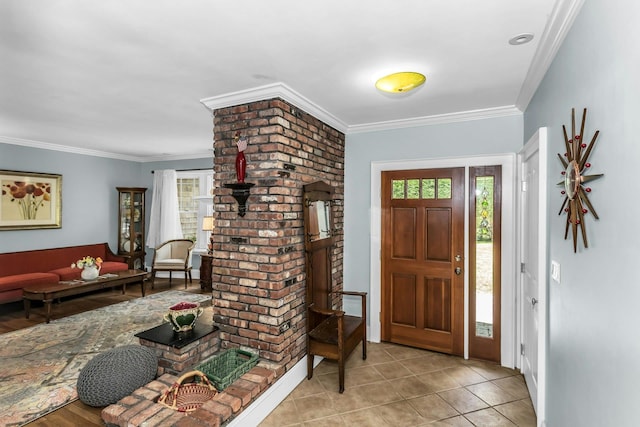 foyer featuring crown molding and light tile patterned floors