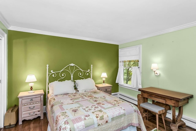 bedroom with a baseboard heating unit, ornamental molding, and wood finished floors
