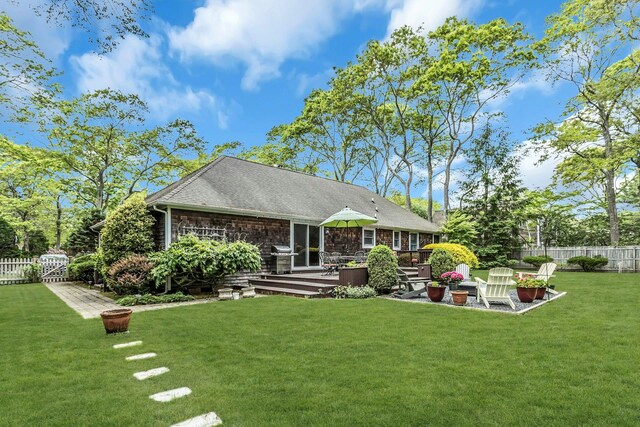 13 Delacey Ave, East Quogue, NY 11942 - rear view of property with a wooden deck and a shingled roof