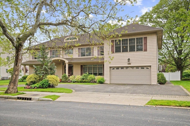525 Green Pl, Woodmere, NY 11598 - view of front of property with an attached garage and driveway