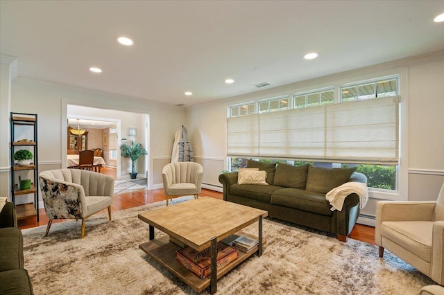 525 Green Pl, Woodmere, NY 11598 - living area featuring crown molding, a baseboard radiator, wood finished floors, and recessed lighting