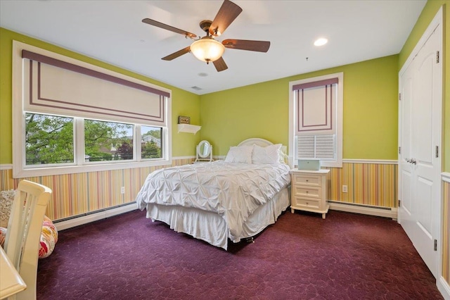 525 Green Pl, Woodmere, NY 11598 - carpeted bedroom featuring a baseboard radiator, wainscoting, ceiling fan, and recessed lighting