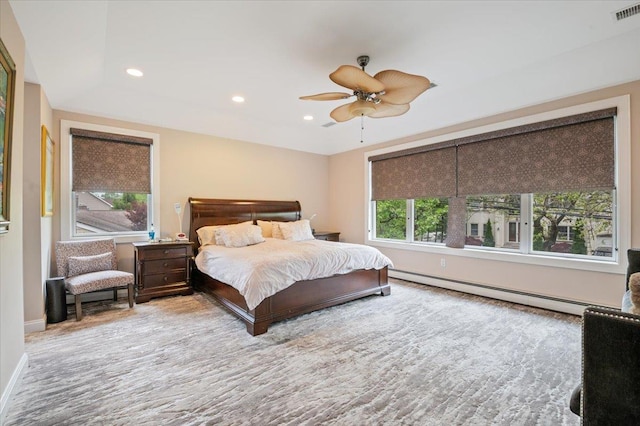 525 Green Pl, Woodmere, NY 11598 - carpeted bedroom featuring baseboard heating, multiple windows, baseboards, recessed lighting, and a ceiling fan