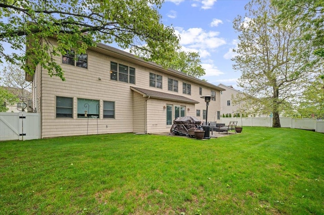 525 Green Pl, Woodmere, NY 11598 - back of house with a gate and a patio area