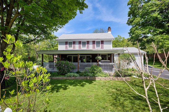 3 Rock Pl, Stanfordville, NY 12581 - view of front of property with a chimney, a porch, and a front lawn