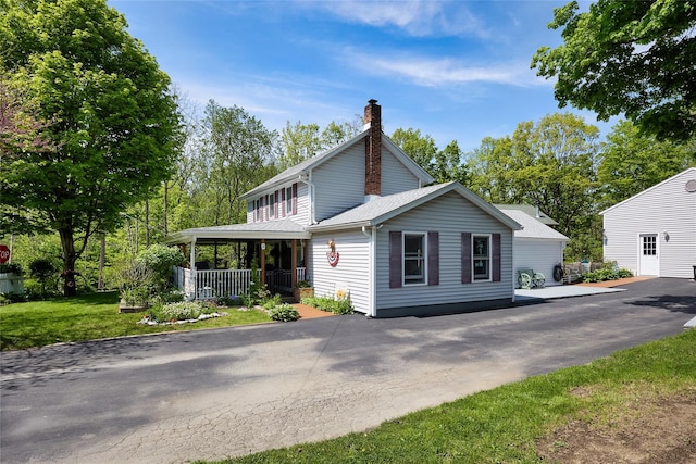 3 Rock Pl, Stanfordville, NY 12581 - view of front of property with a porch and a chimney