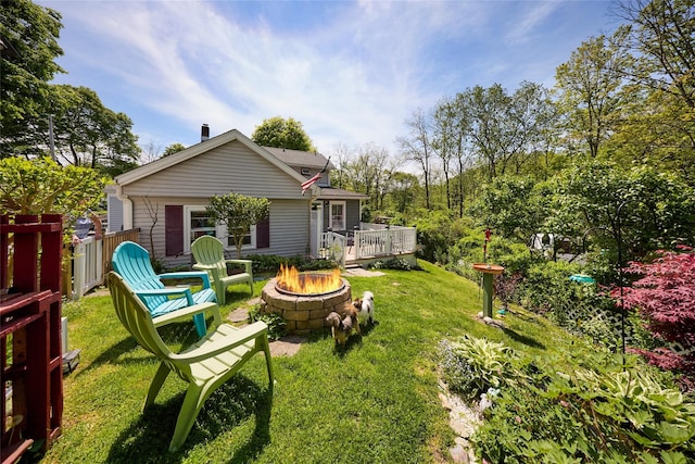 3 Rock Pl, Stanfordville, NY 12581 - rear view of property with an outdoor fire pit, a lawn, and a deck