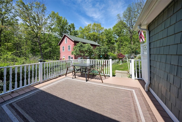 3 Rock Pl, Stanfordville, NY 12581 - view of patio / terrace featuring a wooden deck, outdoor dining space, and view of scattered trees