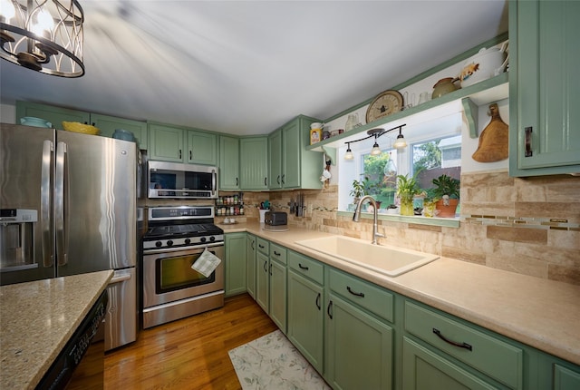 3 Rock Pl, Stanfordville, NY 12581 - kitchen featuring appliances with stainless steel finishes, green cabinets, open shelves, and a sink