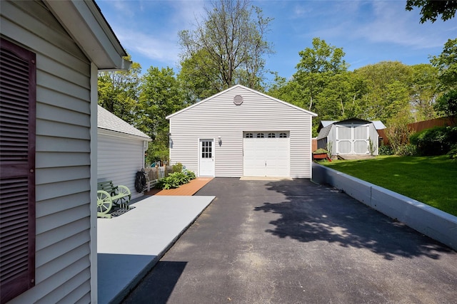3 Rock Pl, Stanfordville, NY 12581 - detached garage with driveway and a shed