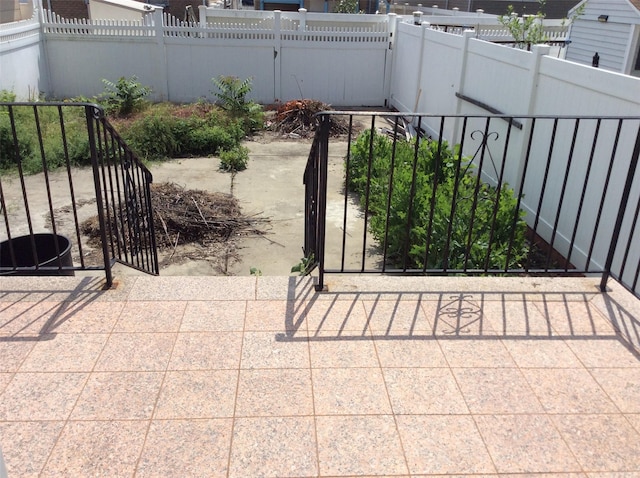 114-30 158th St, Jamaica, NY 11434 - view of patio / terrace with a gate