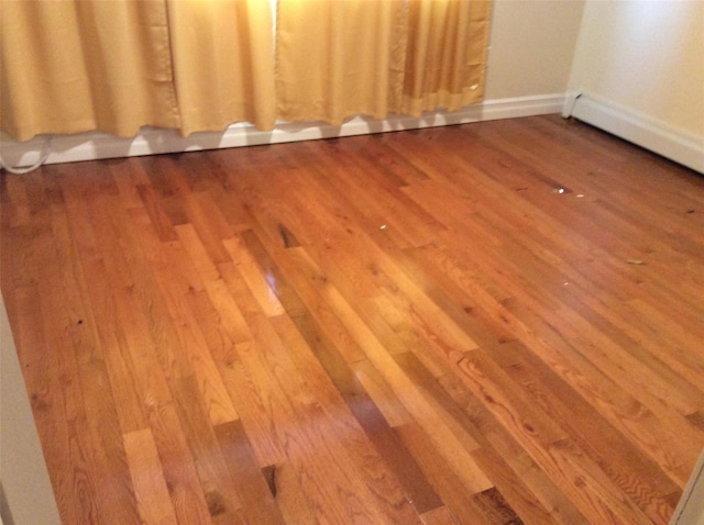 114-30 158th St, Jamaica, NY 11434 - empty room featuring wood finished floors