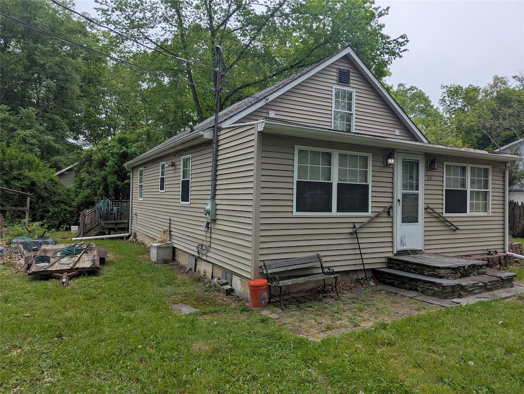 24 Birch St, Bloomingburg, NY 12721 - back of property featuring a lawn