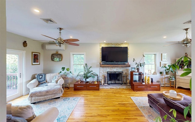 395 Toleman Rd, Washingtonville, NY 12575 - living room featuring ceiling fan, a wall mounted AC, healthy amount of natural light, light wood finished floors, and recessed lighting