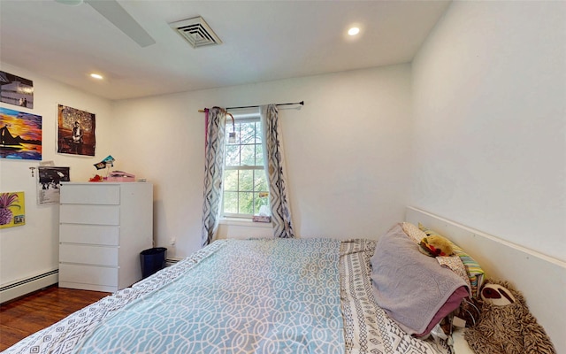 395 Toleman Rd, Washingtonville, NY 12575 - bedroom featuring wood finished floors, recessed lighting, and baseboard heating